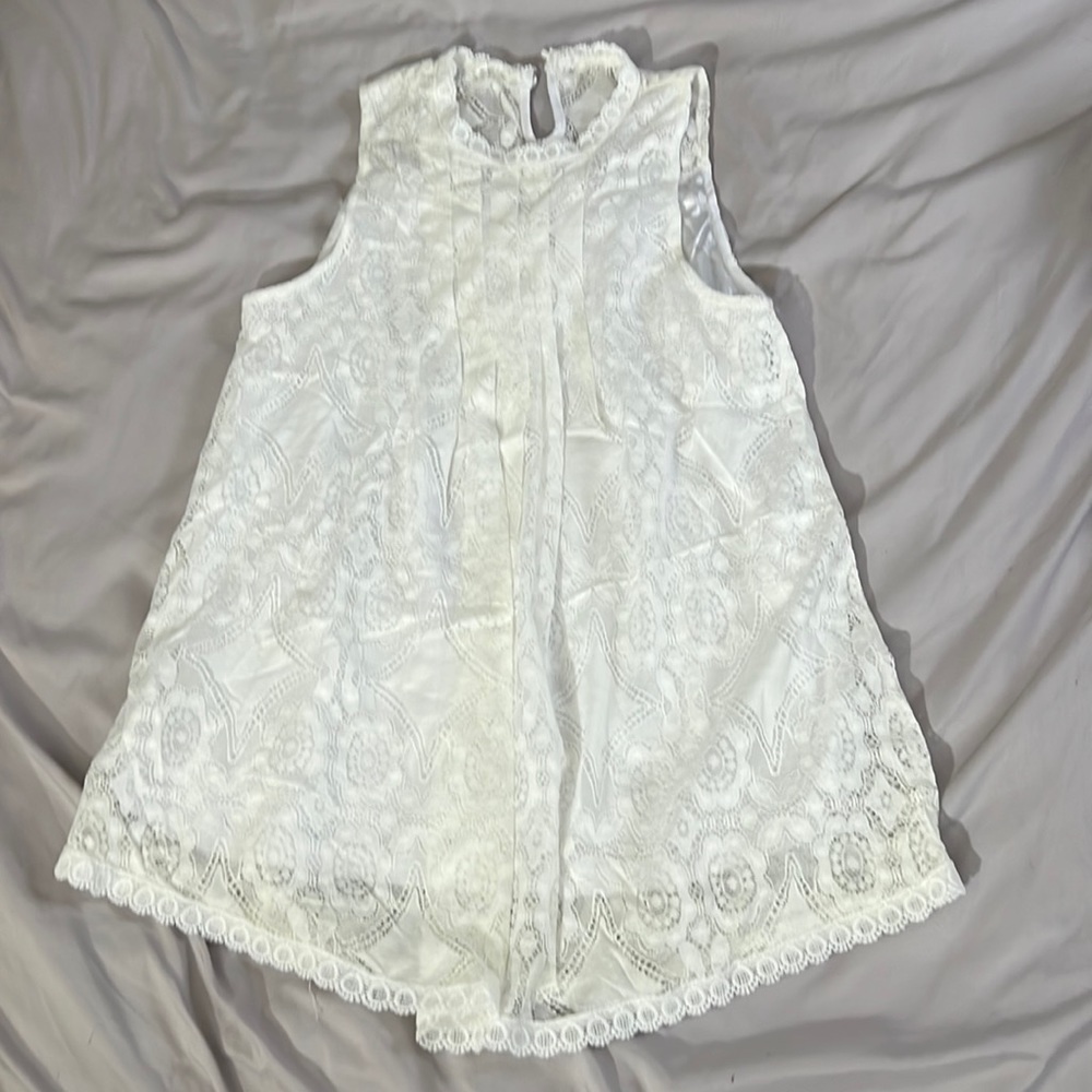 White flowy top